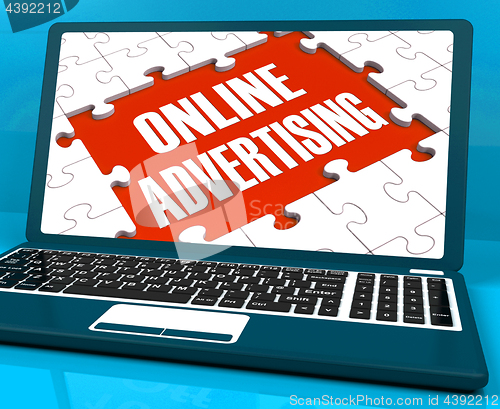 Image of Online Advertising On Laptop Shows Websites Promotions