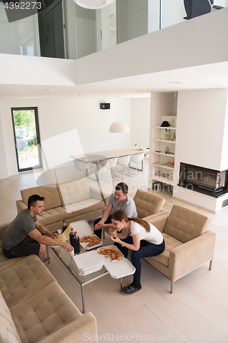 Image of Pizza time a group of people