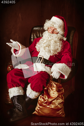 Image of Portrait of Man in Santa Claus Costume