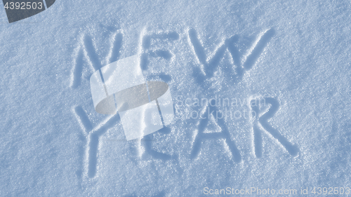 Image of New Year drawing on the snow background