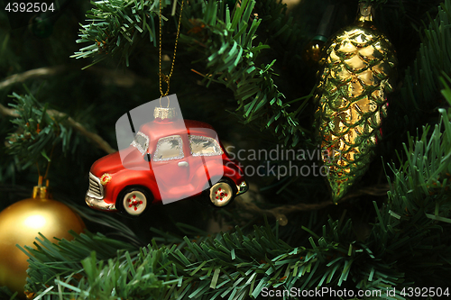 Image of Red car, cone and ball on christmas tree