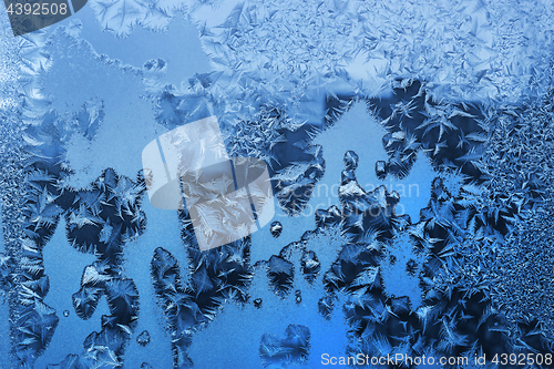 Image of Natural ice pattern on winter glass,