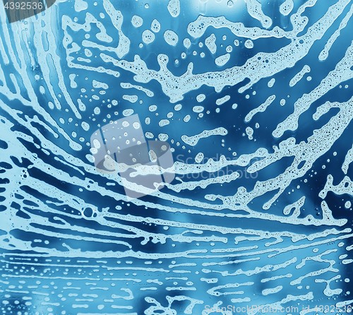 Image of Soap foam pattern on glass