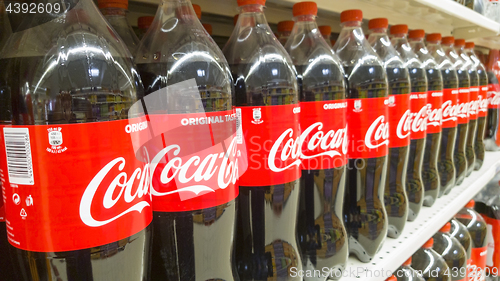 Image of Coca Cola bottles at sale