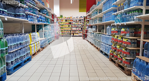 Image of Water bottle in supermarket aisle