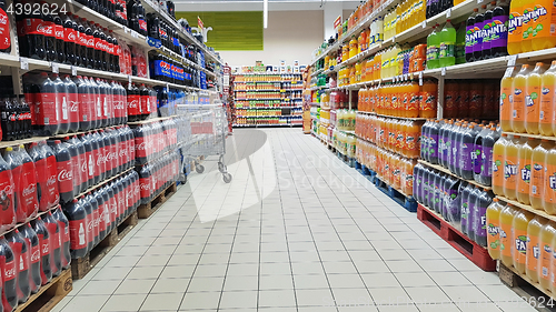 Image of Soda bottle drinks in supermarket