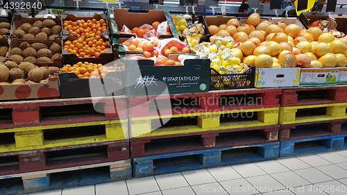 Image of Fruits in supermarket aisle