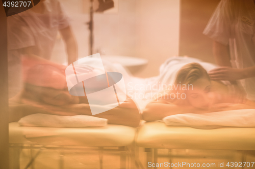 Image of couple receiving a back massage