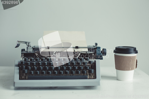 Image of old typewriter on the table