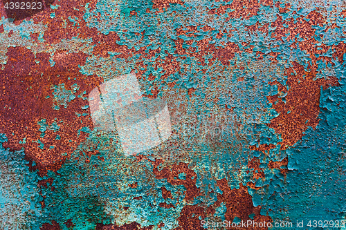 Image of Rusty Colored Metal with cracked paint