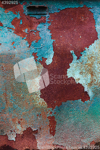 Image of Rusty Colored Metal with cracked paint