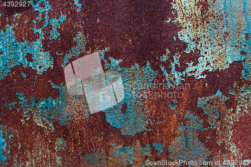 Image of Rusty Colored Metal with cracked paint