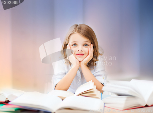 Image of student girl reading book