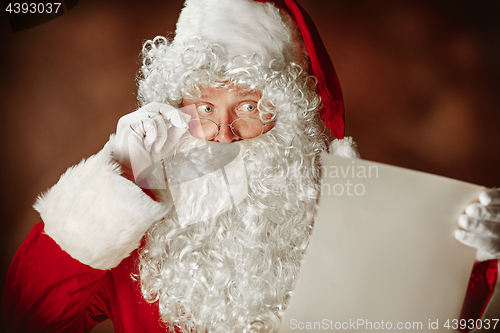 Image of Portrait of Man in Santa Claus Costume