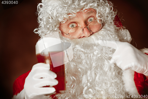 Image of Portrait of Man in Santa Claus Costume