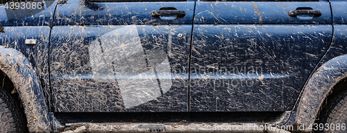 Image of Side view of the dirty car