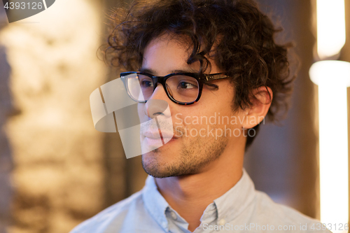 Image of close up of man in glasses