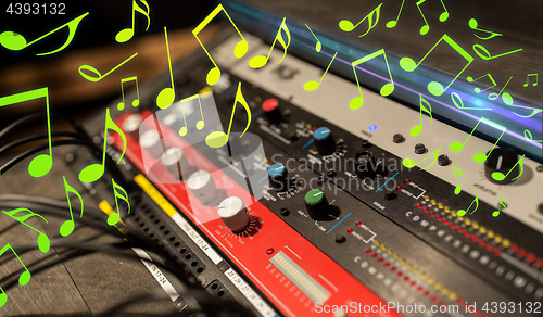 Image of close up of music mixing console