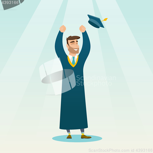 Image of Graduate throwing up graduation hat.