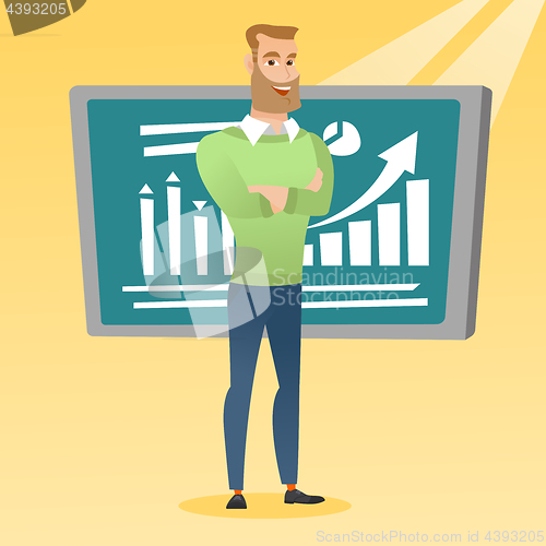 Image of Teacher or student standing in front of chalkboard