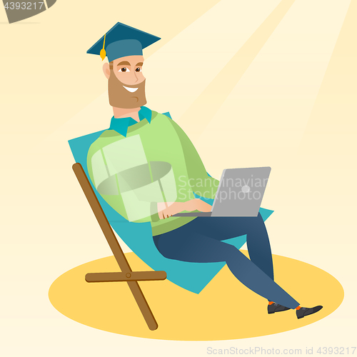 Image of Graduate sitting in chaise lounge with laptop.