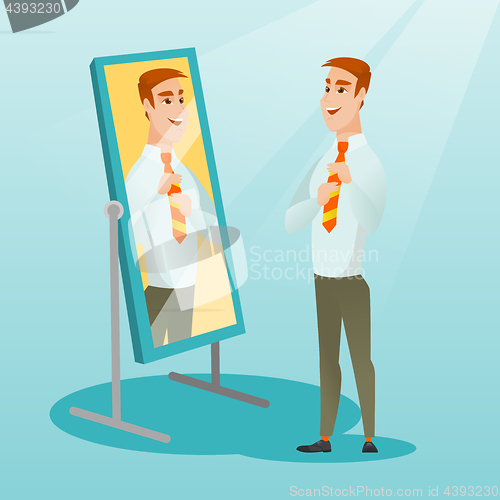 Image of Business man looking himself in the mirror.