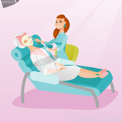 Image of Woman in beauty salon during cosmetology procedure