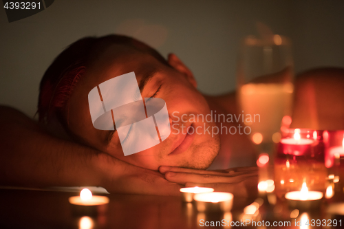 Image of man relaxing in the jacuzzi