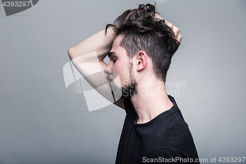 Image of Professional studio portrait of young handsome man