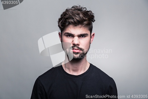 Image of Professional studio portrait of young handsome man