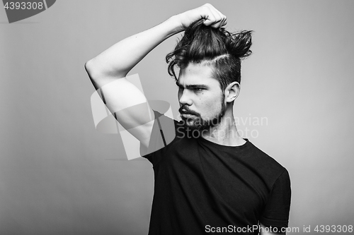 Image of Professional studio portrait of young handsome man