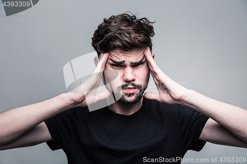 Image of Man feeling pain,  with gray background