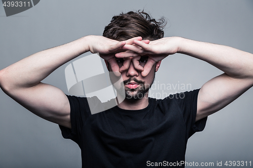 Image of Professional studio portrait of young handsome man