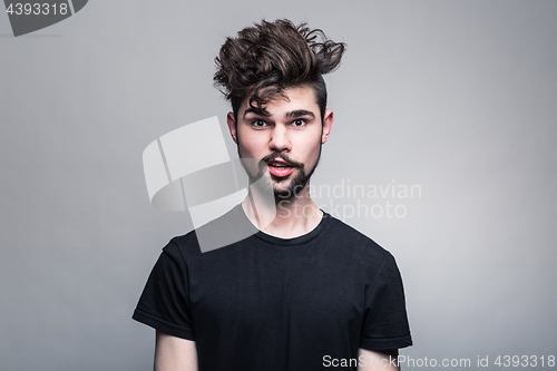 Image of Professional studio portrait of young handsome man