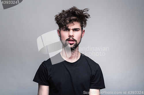 Image of Professional studio portrait of young handsome man