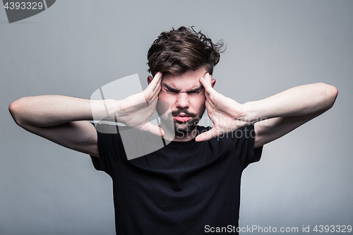 Image of Man feeling pain,  with gray background