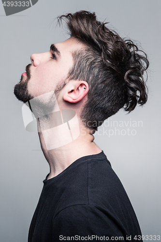 Image of Professional studio portrait of young handsome man