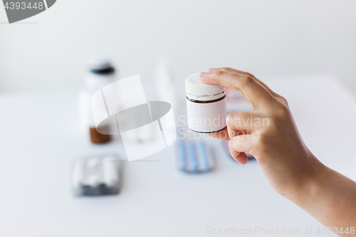 Image of close up of doctor hand with medicines