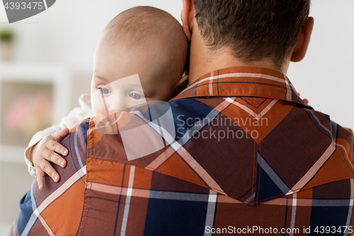 Image of close up of happy little baby boy with father