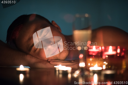 Image of man relaxing in the jacuzzi