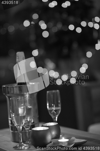 Image of champagne on a wooden table