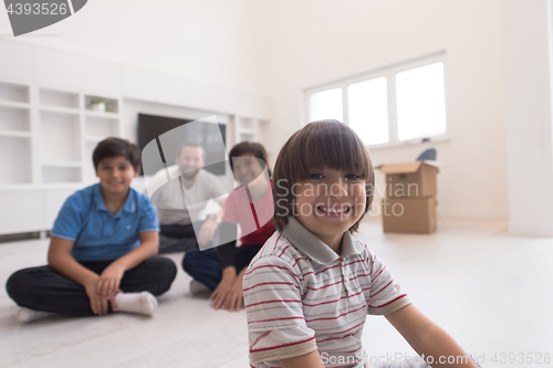 Image of portrait of happy young boys with their dad