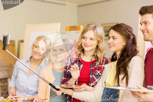 Image of group of artists taking selfie at art school