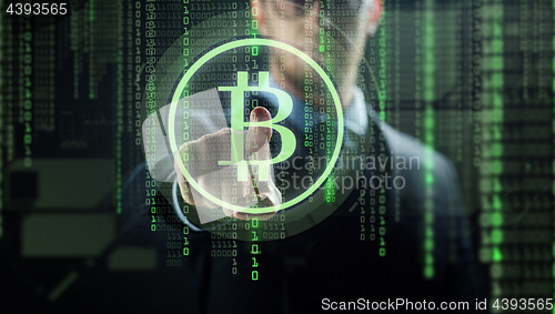 Image of close up of businessman with bitcoin hologram