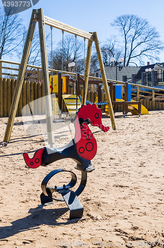 Image of Children\'s swing in the form of a seahorse