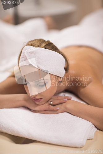 Image of woman laying on massage table