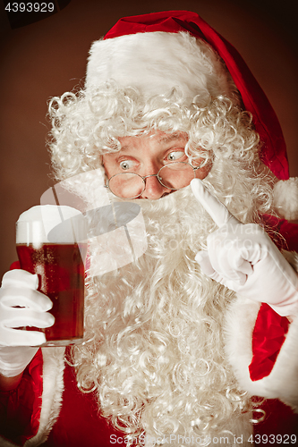 Image of Portrait of Man in Santa Claus Costume