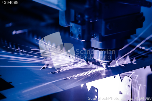 Image of CNC Laser cutting of metal, modern industrial technology.