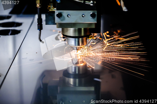 Image of CNC Laser cutting of metal, modern industrial technology.