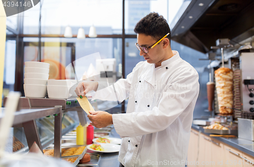 Image of chef at kebab shop